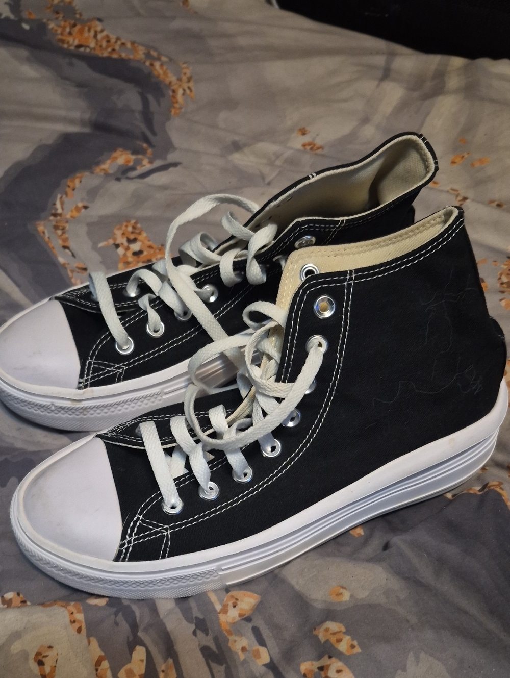 Converse Black and White High-Top Sneakers